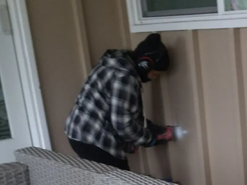 Professional electrician installing an exterior outlet in Salamanca
